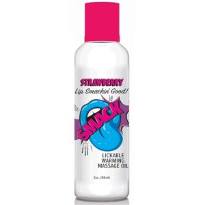 Smack Strawberry 2 fluid ounces Warming Massage Oil from Little Genie. Take your partner on a tantalizing flavor journey with Smack Warming and Lickable Massage Oil. Engage in a tasty and playful massage experience in six delectable flavors: Blue Raspberr