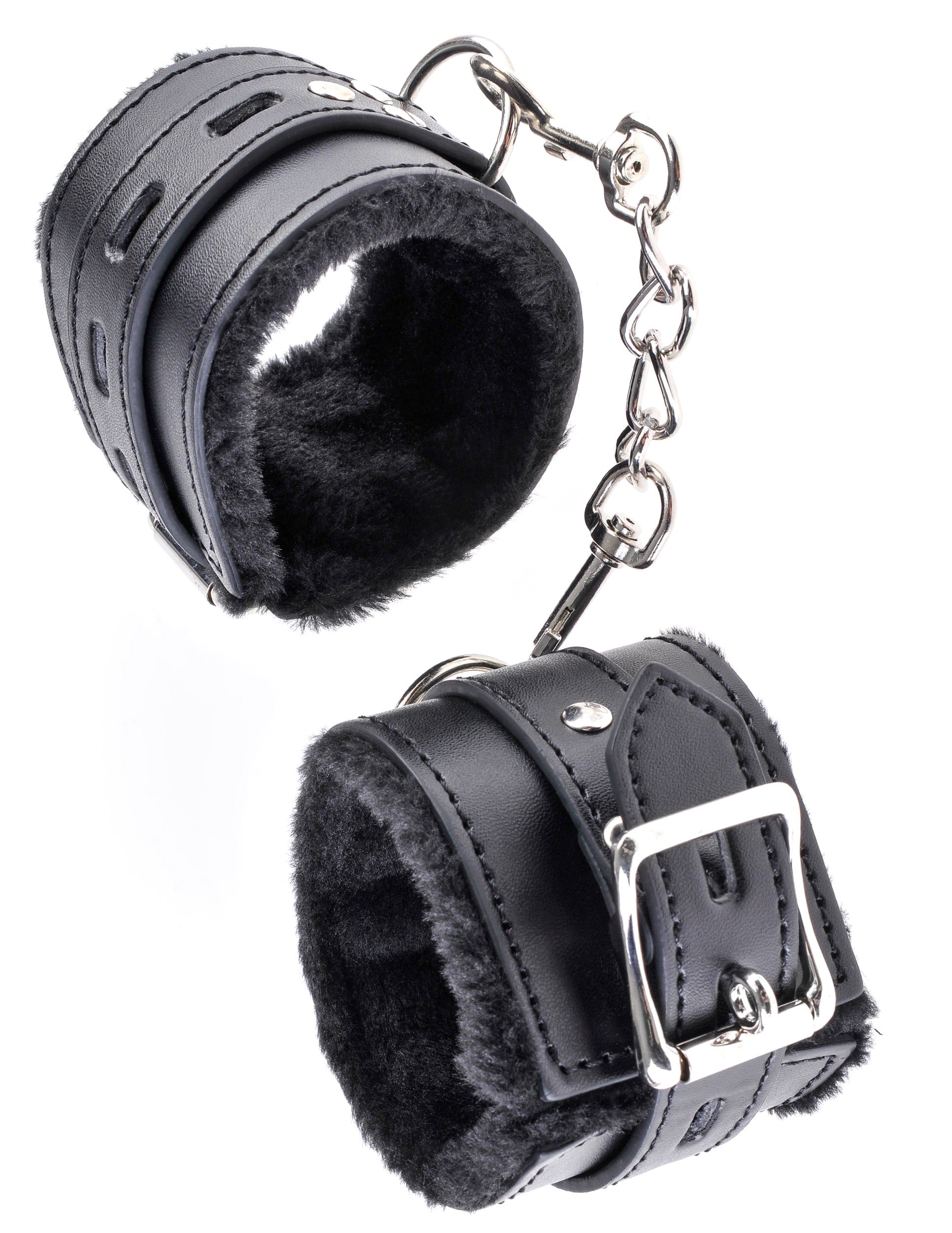 Fetish Fantasy Limited Edition Cumfy Cuffs Black from Pipedream Products. The use of restraint has always been a sexual stimulant with these fur lined Cumfy Cuffs