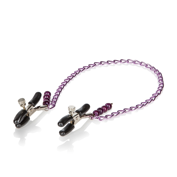 Nipple Clamps Purple Chain with Navel Ring is a matching set of body jewelry. Totally adjustable rubber coated nipple clamps with a non-tarnishing purple chain and purple bead navel ring. Adjustable nipple clamps are easy to change pinch