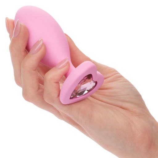 First Time Love Crystal Booty Duo Pink from California Exotic Novelties. Indulge your naughtiest fantasies and open yourself up to thrilling back door play with the First Time Crystal Booty Duo. This play ready kit includes 2 graduated anal plugs with daz
