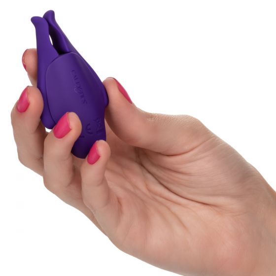 Nipple Play Rechargeable Nipplettes Purple from California Exotic Novelties. Blur the borders between pleasure and pain even further with the game changing Nipple Play Rechargeable Nipplettes. This daring designer nipple clamp set features 12 independentl