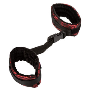 Scandal Control Cuffs from California Exotic Novelties new Scandal line. Creativity 44 Print Silver. Embrace your adventurous side and relinquish control or command it with the Scandal Control Cuffs. These beautifully designed red and black brocade cuffs