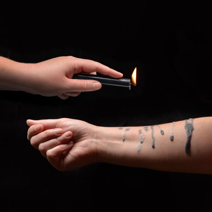 Lacire Black Drip Candles 3 Massage Candles from Sportsheets. Experience the delicious tension of temperature play with these sensual drip candles. Made of body safe paraffin wax