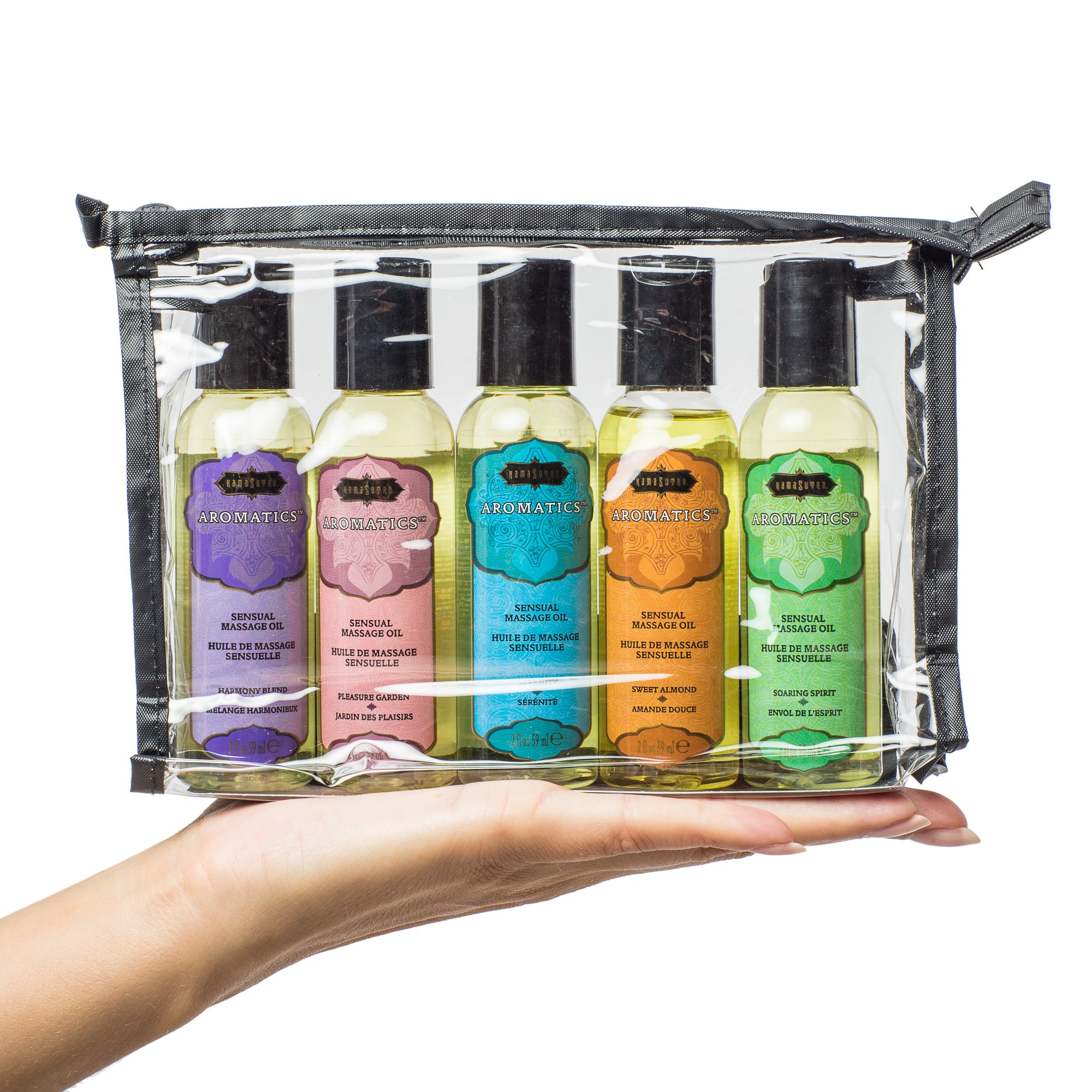 Kama Sutra Massage Tranquility Kit take romance with you. Try all of five blends of Kama Sutra Aromatics Massage Oil with this travel kit. Includes five petite massage oils in a zippered travel case. The TSA approved sizes are perfect for travel. Made wit