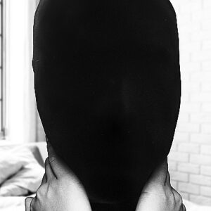 B&W SUBJUGATION MASK ALLOWS JUST A HINT OF LIGHT